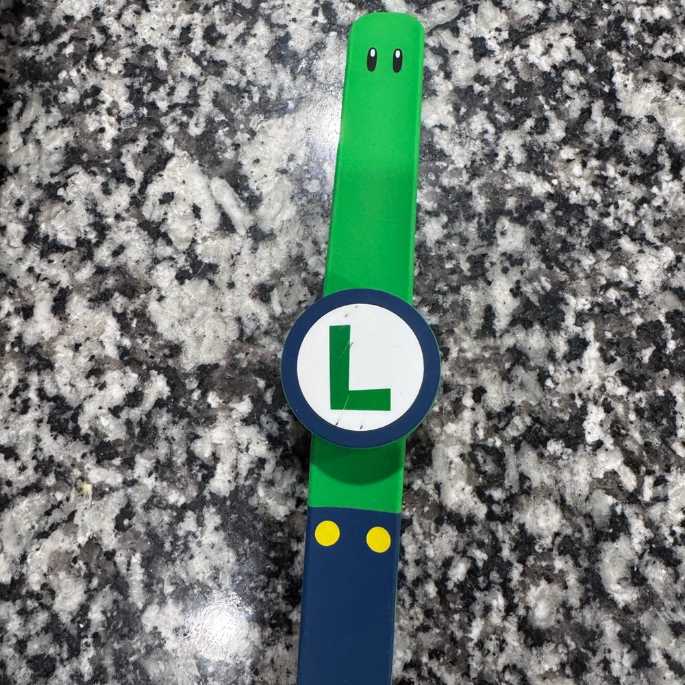Super Nintendo Power Up Band Luigi worn once